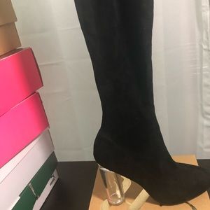 Black knee high boots with clear heels